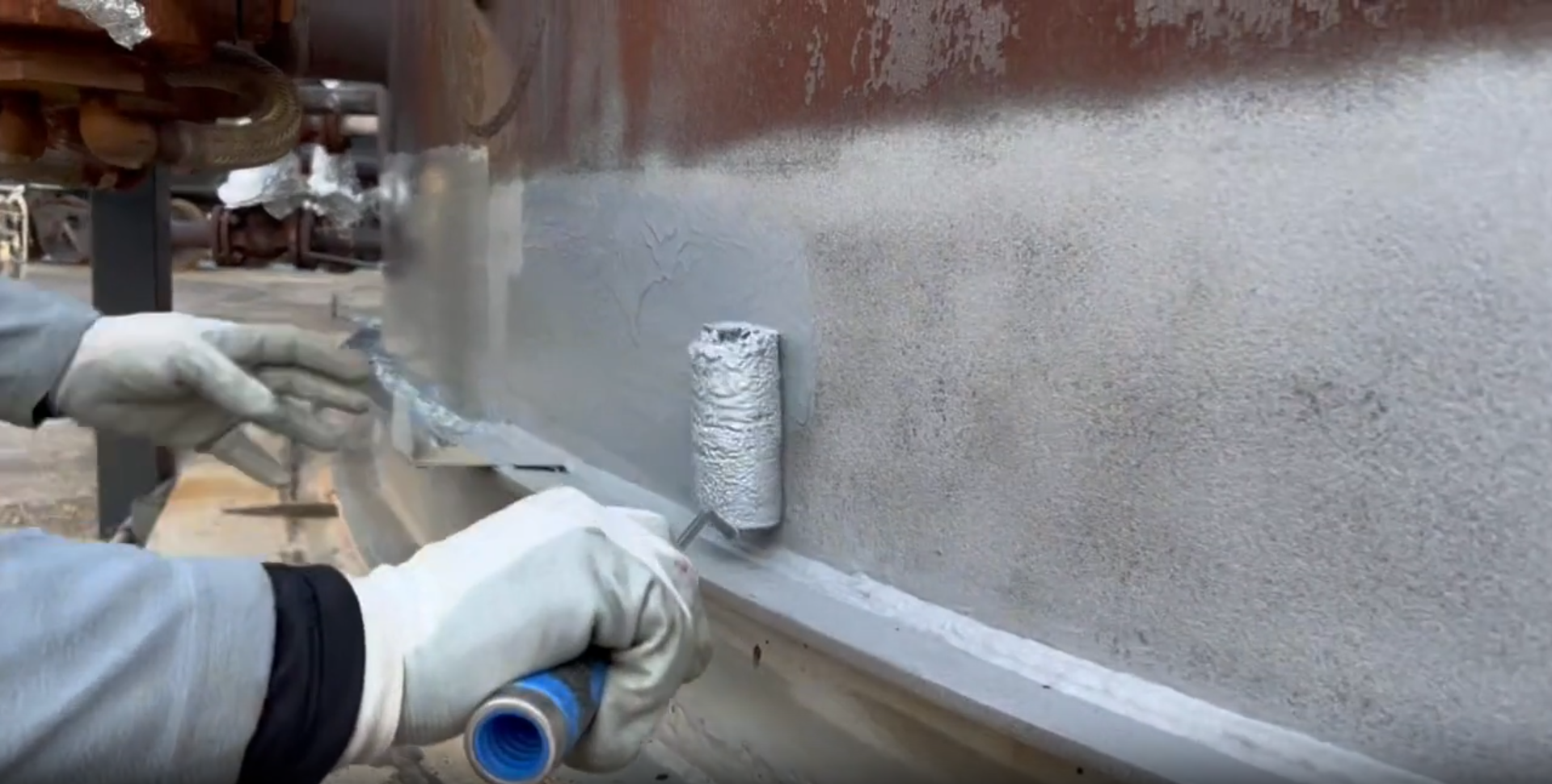 Protective coating applied to structural steel after abrasive blasting