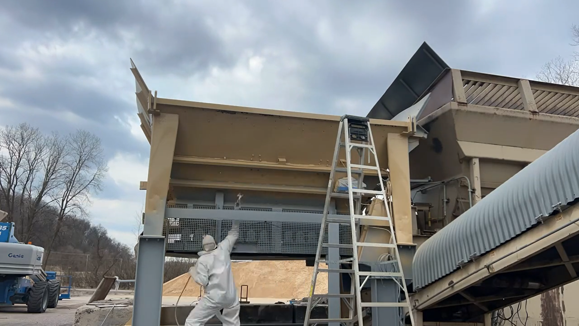 Primer and polyurea coating application on facility structure